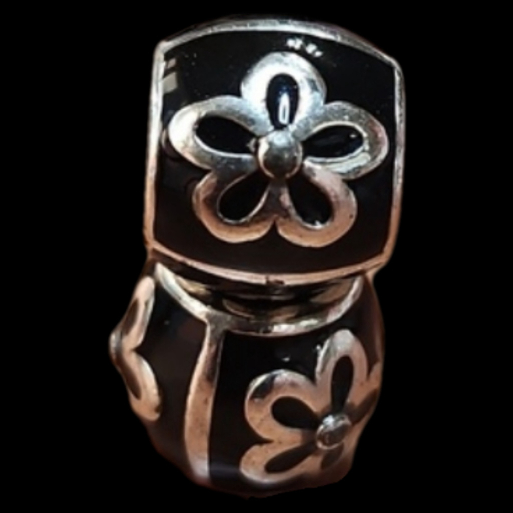 Brighton black enamel bead with silver outlined flowers